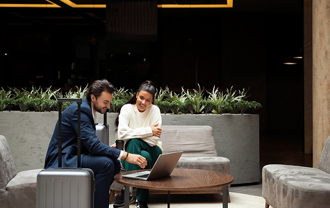 Couple relaxing on hotel terrace